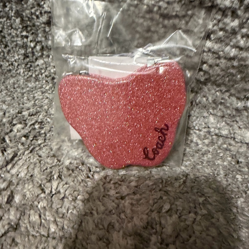 Coach Glitter Butterfly
Compact Mirror - Picture 2 of 7